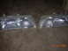 1995 Ford Taurus - Pair of car headlights shown on a carpeted floor. Date stamp indicates 07.20.2009.