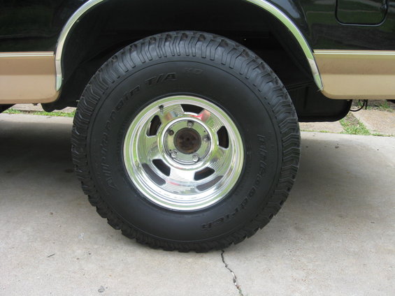 1994 Ford Bronco side view with BFGoodrich All-Terrain T/A tires and chrome wheels