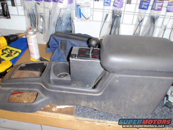box screwed on and poste cut out for shifter and tq converter button