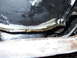 1989 Ford Bronco - The oil pan is leaking fluid, indicating a potential mechanical issue.