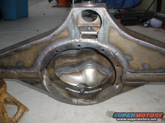 Custom fabricated rear axle housing with heavy welds and a large differential cover opening