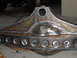 1995 Ford Bronco - A custom-fabricated rear axle housing is shown, numerous circular cutouts along its length and prominent welding work.