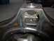 1995 Ford Bronco - Close-up of a fabricated rear axle housing, showing extensive welding and metalwork.