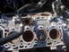 1995 Ford Bronco - This is a close-up view of an engine block, showing the cylinder bores and some attached hoses.