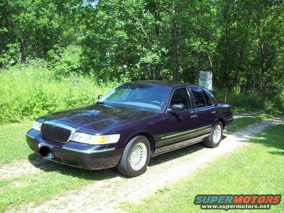 Dark purple 1999 Mercury Grand Marquis sedan, 3/4 front view