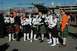 1990 Ford Bronco - A group of cosplayers, some in kilts, pose with a prop spaceship in the background.