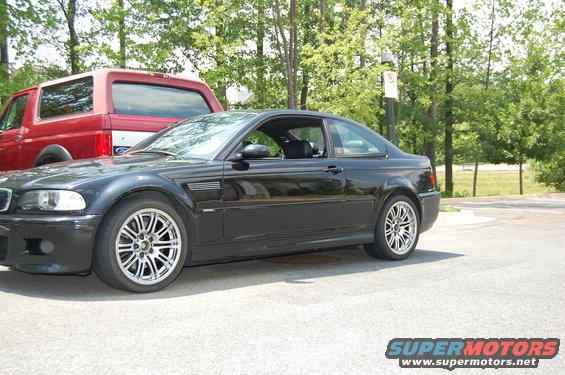 Black 2002 BMW M3 coupe, 3/4 front view