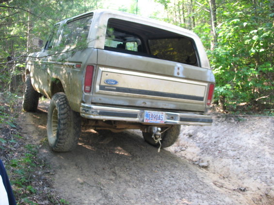 Rear view of a 1978 Ford Bronco on a dirt trail