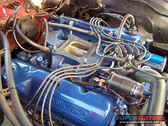 100_2901.jpg Holley carb has been removed and I'm ready to re-install the new Demon carb; I installed a 1/4 insulator below the carb, trying to keep the fuel bowls from getting heat soaked.