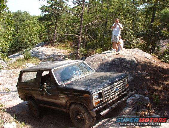 21traction3.jpg Elwood then followed Rescue up Traction (52) with no problem.  I then descended from the R in the trees, crossed the ledge directly behind Elwood, and followed him & Rescue between these rocks.

[url=http://www.supermotors.net/registry/media/747112][img]http://www.supermotors.net/getfile/747112/thumbnail/747112.jpg[/img][/url]