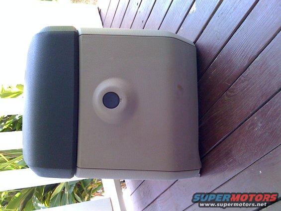 center-console-001.jpg :Left rear corner has a small crack from when the guy shipped to me. It can be repaired but doesn't affect anything nor can it be seen when installed. The mark on the back will be removed. Not sure how I missed that.