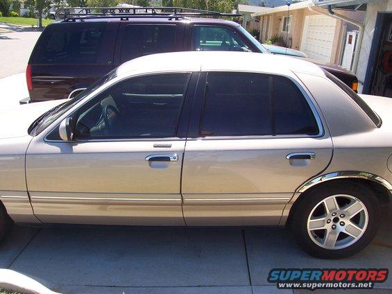 100_0460.jpg 5% (Limo) back doors and rear window. 35% smoked front doors.