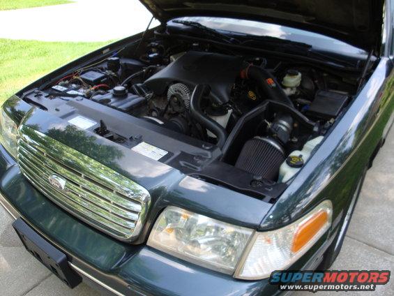 1999 Ford Crown Victoria engine bay with aftermarket air intake
