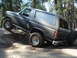 1984 Ford Bronco - This 1984 Ford Bronco navigates a rocky trail, its off-road capabilities.