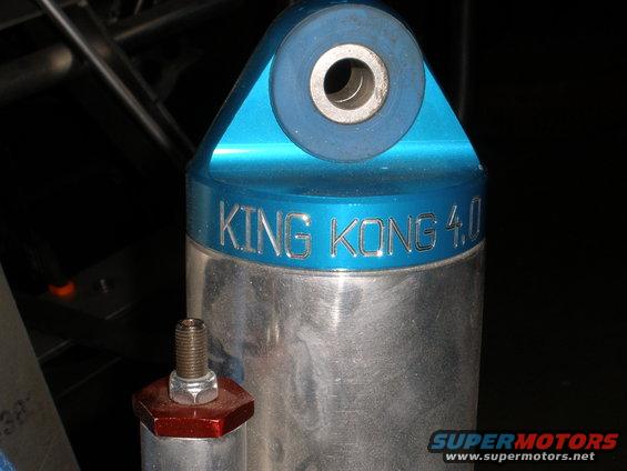 Close-up of a King Kong 4.0 shock absorber with blue top mount
