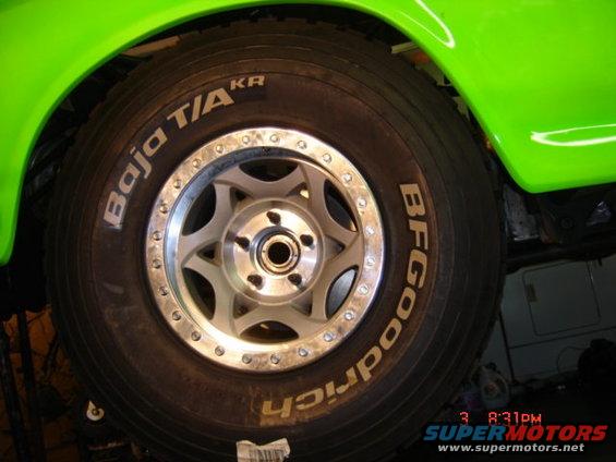 BFGoodrich Baja T/A tire on a custom wheel, part of a green vehicle
