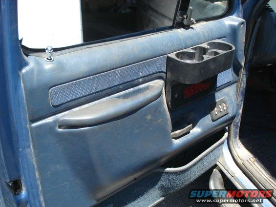 Drivers side door panel. Power windows and lock not tested but all there.