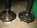 2000 Ford Crown Victoria - Close-up view of two used axle shafts with hubs, showing wear on the splines.