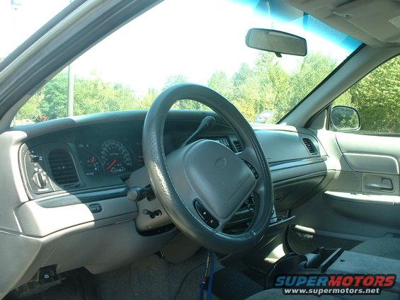 2000 Ford Crown Victoria interior showing dashboard, steering wheel, and gauges