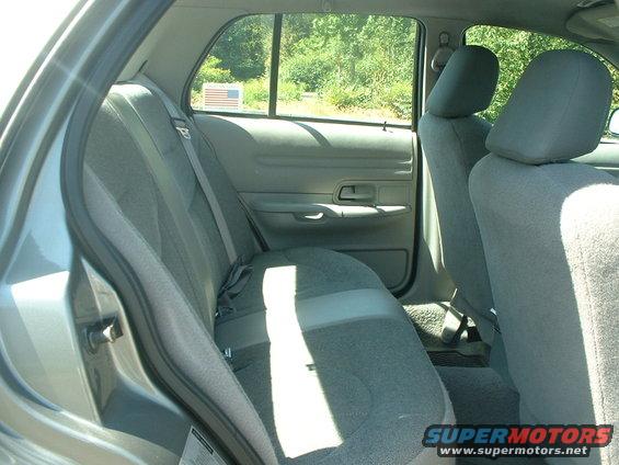 Rear seats and door panel of a 2000 Ford Crown Victoria, view from passenger side