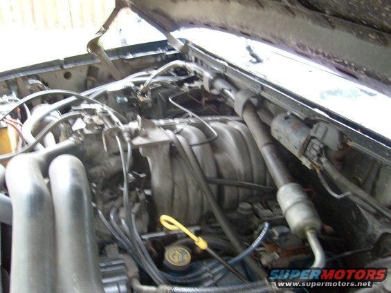 s7300942.jpg You can tell by all the wet a/c hoses the new ac system i put in works great, got down to 40F today and it was dang 97F outside. 