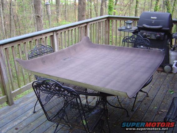 dsc03110.jpg Headliner from the removable top of a 94 Eddie Bouer. Already started dying it black.