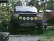 1984 Chevrolet Blazer - This modified pickup truck has a custom bumper with four auxiliary lights, two with smiley face covers.