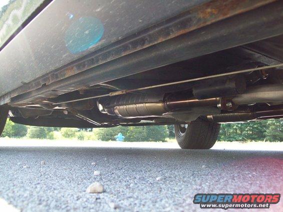 Underbody view of a car's exhaust system with a Magnaflow catalytic converter
