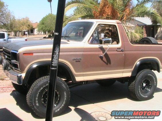 Brown and tan 1985 Ford Bronco, 3/4 front view