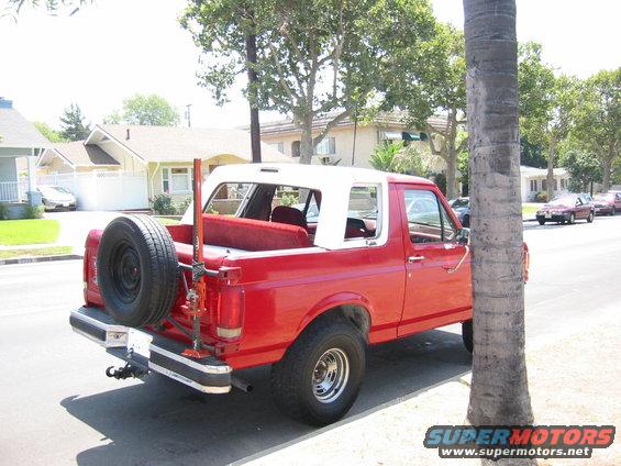 halftop3.jpg There is a flat piece of steel screwed into the tops metal frame.