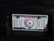 1999 Volkswagen Beetle - A Texas license plate features a hurricane graphic and skull-shaped bolt covers.