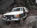1991 Ford Bronco - This 1991 Ford Bronco is shown off-roading on a challenging rocky path.