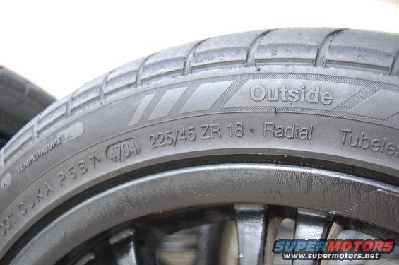 Tire with "Outside" marking, size 225/45 ZR 18, and DOT code 4704