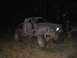 1985 Toyota Pickup/SR5 - This heavily modified truck is covered in mud and appears to be off-road.