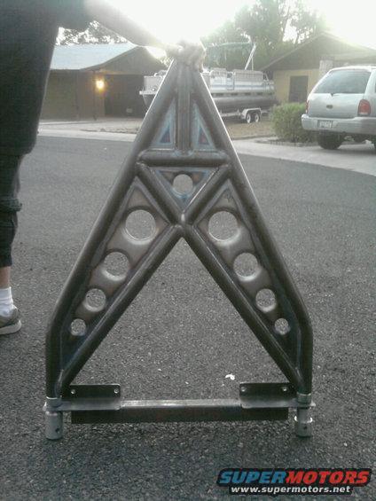 Custom metal A-frame part with circular cutouts