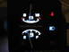 1996 Ford F-150 - Close-up of illuminated dashboard gauges showing fuel level and battery status.