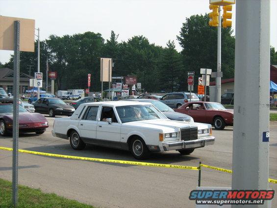 1988 Mercury Grand Marquis driving, other cars visible