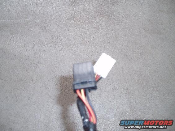 Wiring harness connector with red and orange wires