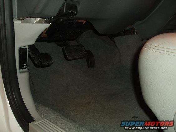 Interior view of a car's passenger side door and seat