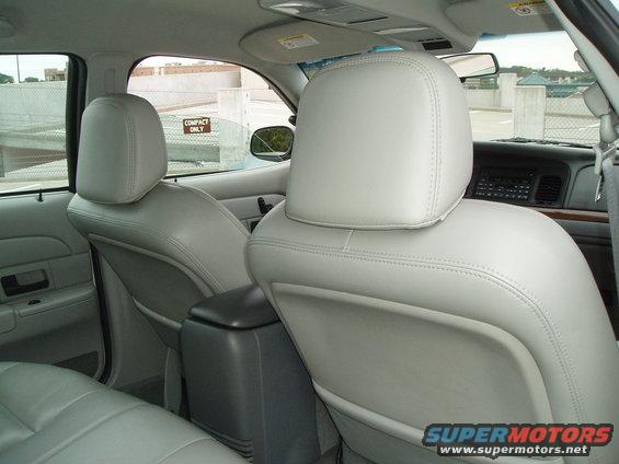 Light gray leather seats and center console inside a 2003 Ford Crown Victoria