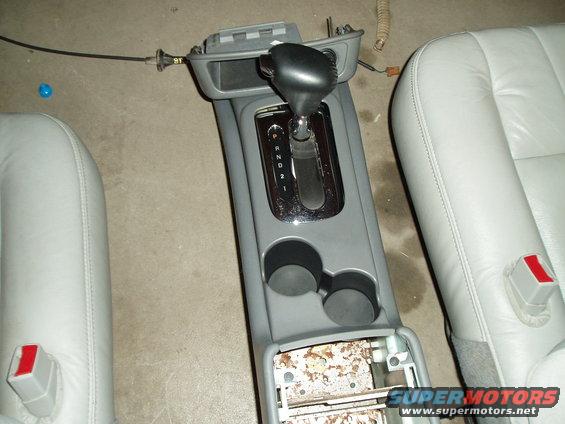 Car interior center console with gear shifter and cup holders