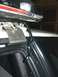 1993 Ford Mustang - Close-up of wiring for a Code 3 Public Safety Equipment light bar, attached to a vehicle's roof.