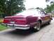 1979 Ford Thunderbird - Rear view of a 1979 Ford Thunderbird coupe with a purple finish and chrome accents.