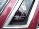 1979 Ford Thunderbird - A close-up of a car's rear side window displays the 'Town Landau' emblem.