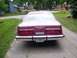 1979 Ford Thunderbird - Rear view of a maroon 1977 Ford Thunderbird, showing its distinctive taillights and chrome bumper.