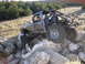 1984 Ford Bronco II - This heavily modified truck navigates a rocky terrain, its off-road capabilities.