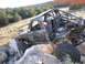 1984 Ford Bronco II - This heavily modified off-road vehicle navigates a rocky trail.