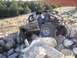 1984 Ford Bronco II - This modified 1984 Ford Bronco II navigates a challenging rocky terrain, its off-road capabilities.