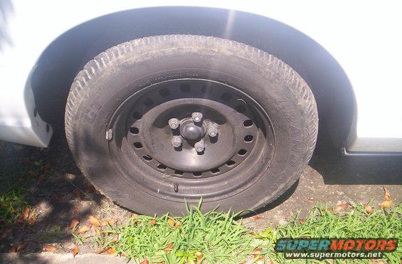 3610563411_e6da51a0db_b.jpg Ugly hubcaps removed getting center caps soon.