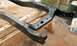 1978 Ford Bronco - A vehicle frame, likely undergoing restoration, is shown resting on sawhorses.